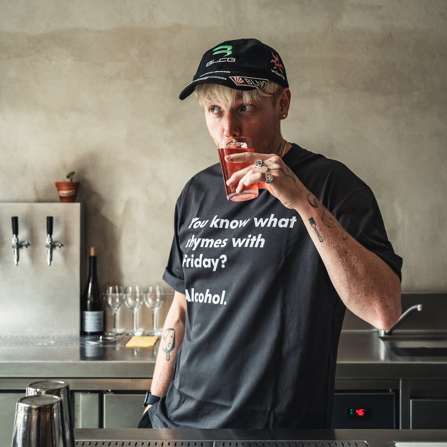 You know what rhymes with Friday? Alcohol T-Shirt by Broken Bartender