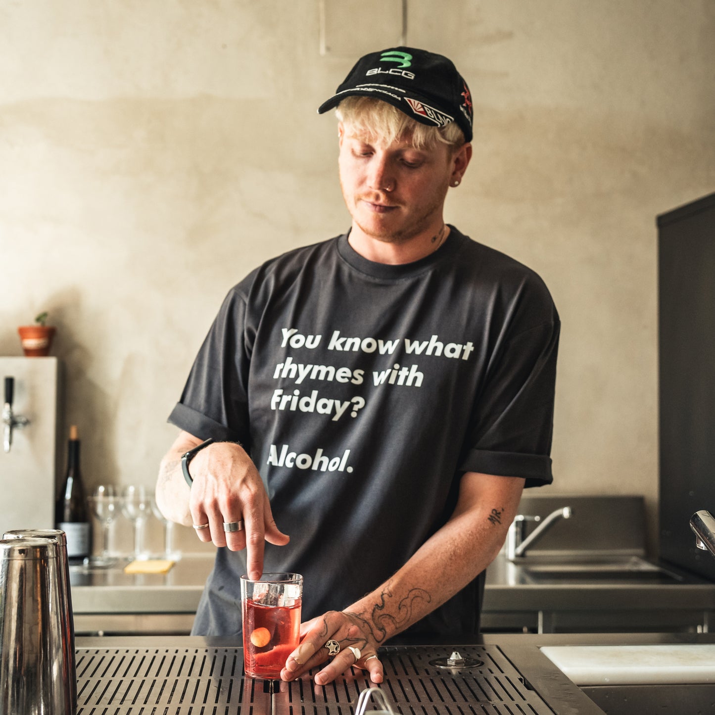 You know what rhymes with Friday? Alcohol T-Shirt by Broken Bartender