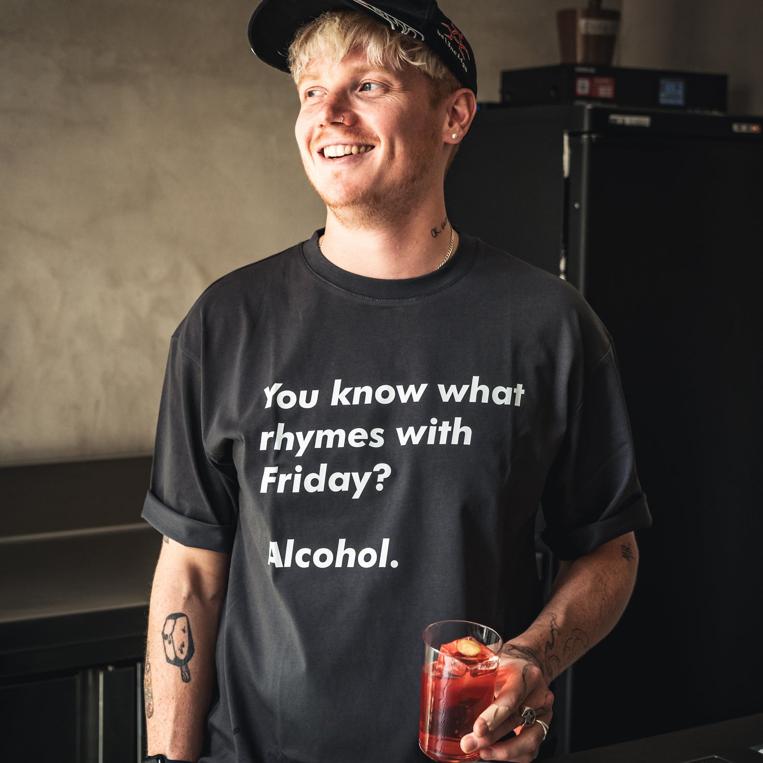 You know what rhymes with Friday? Alcohol T-Shirt by Broken Bartender